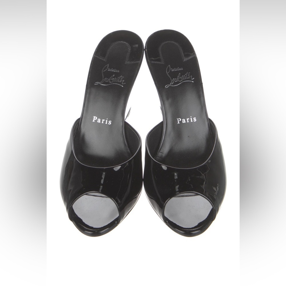 CHRISTIAN LOUBOUTIN
Me Dolly Zeppa patent leather sandals